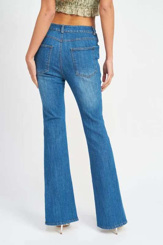 FLARED JEANS WITH SLITS